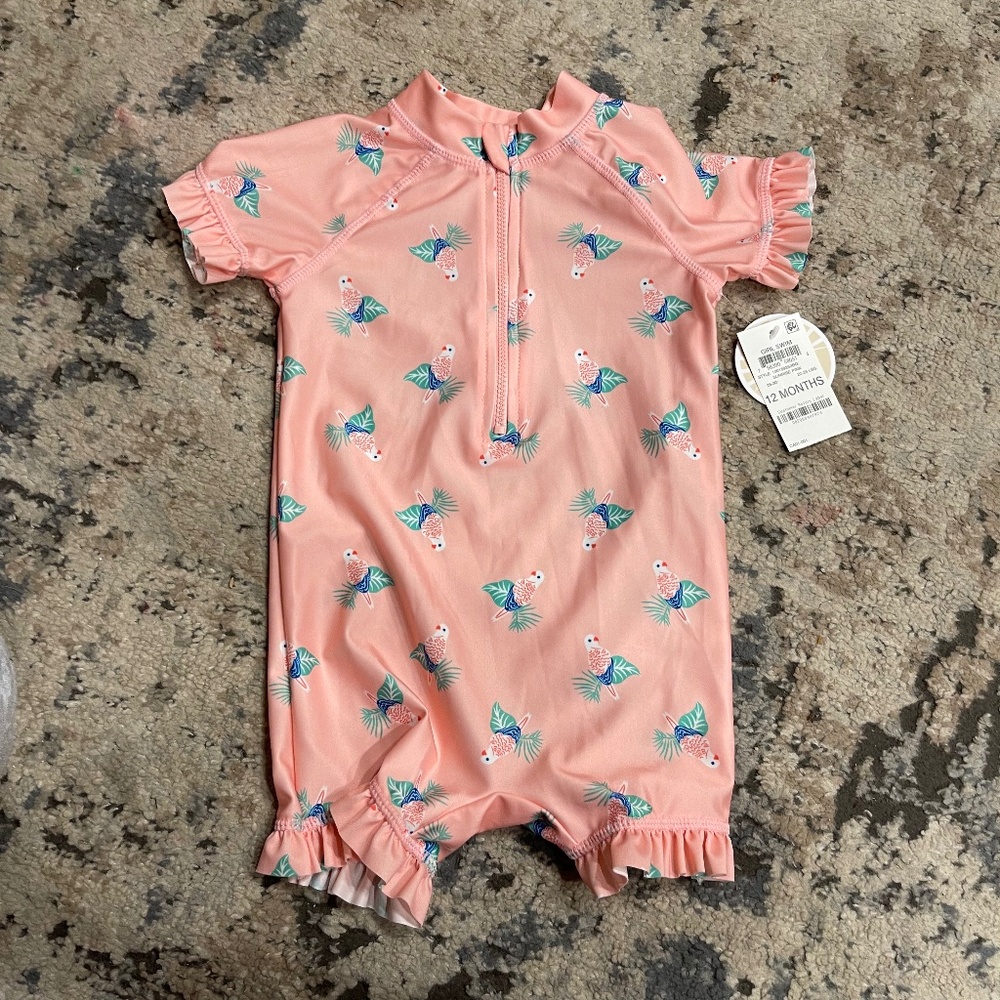 First impression 12 Month bathing suit tags on